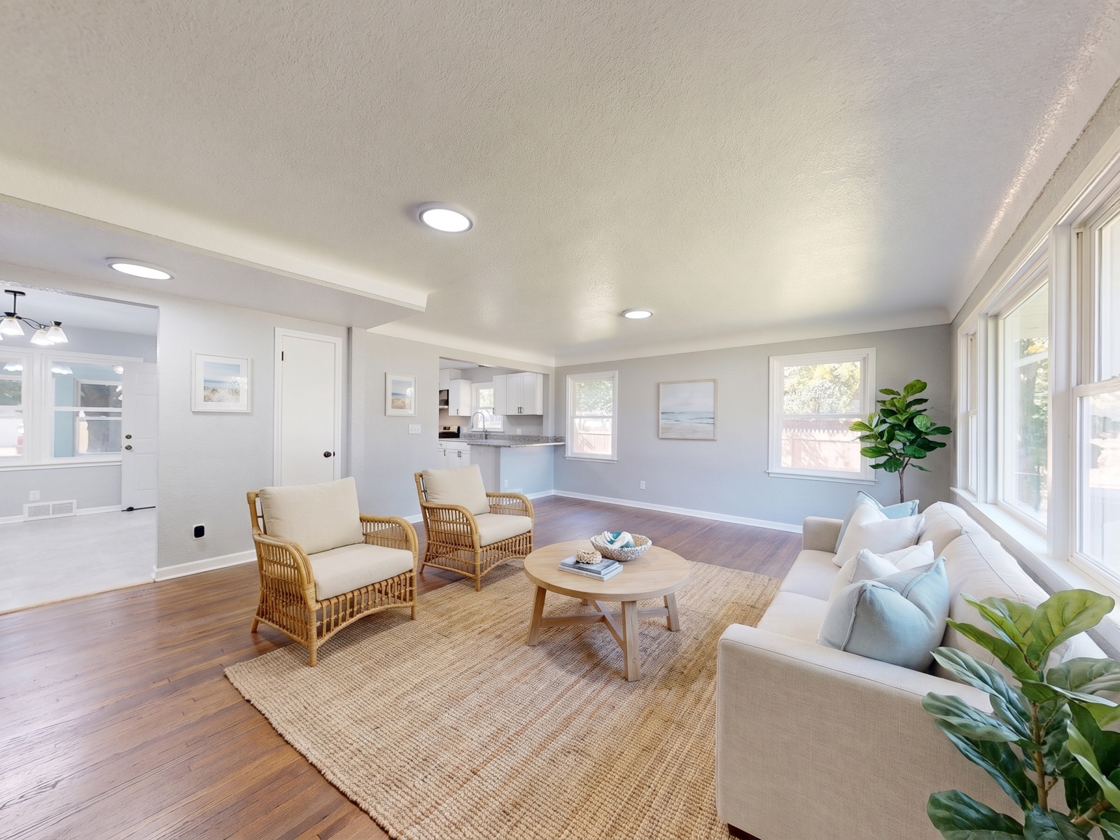 Same living room after: bright and virtually staged